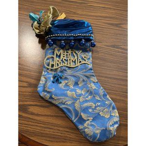 Christmas stocking blue decorated with gold accents